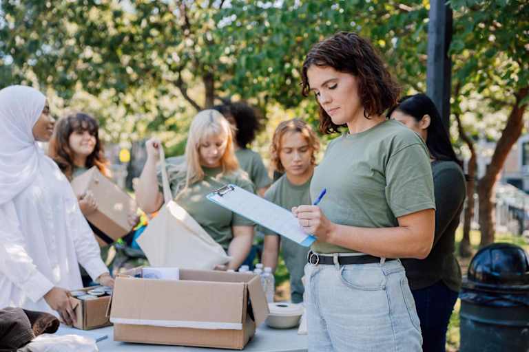 Nonprofit coordinator at community donation event