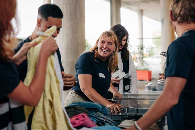 Social worker coordinating donations at community center